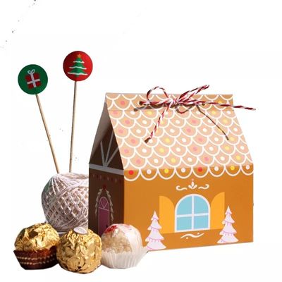 La Camera modella i contenitori di regalo di Natale per il cartone eliminabile di Candy