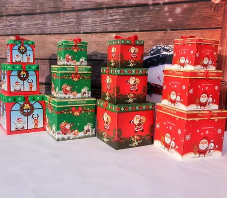 Coperchio e scatola bassa delle decorazioni di Natale dei contenitori di regalo del cartone di Natale con il nastro